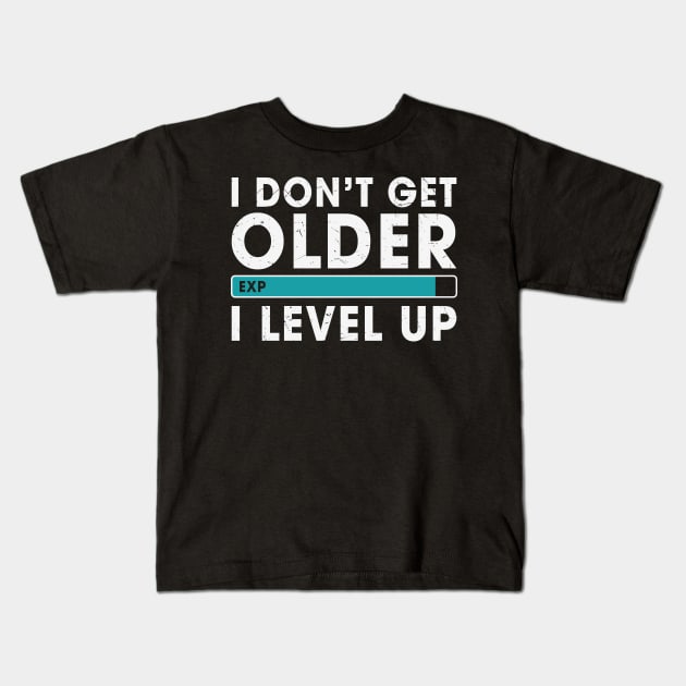 Funny Video Gamer Birthday Gift For Him Her I don't Get Older I level Up Kids T-Shirt by BadDesignCo